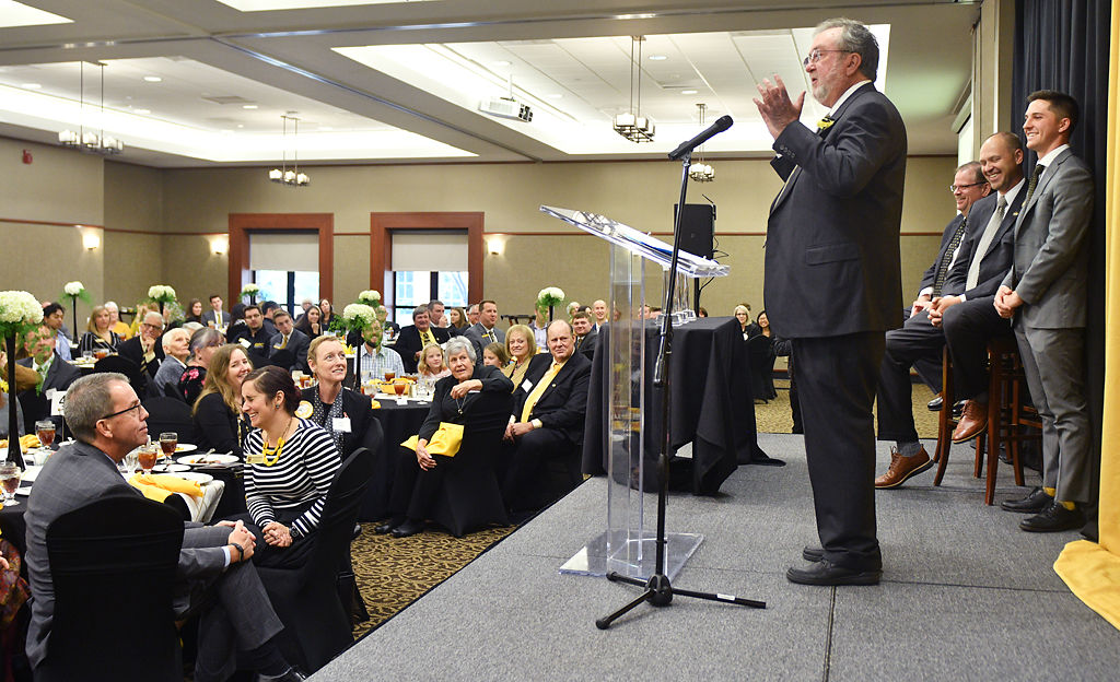 Andy Bryant addresses the crowd after receiving his Hall of Fame award
